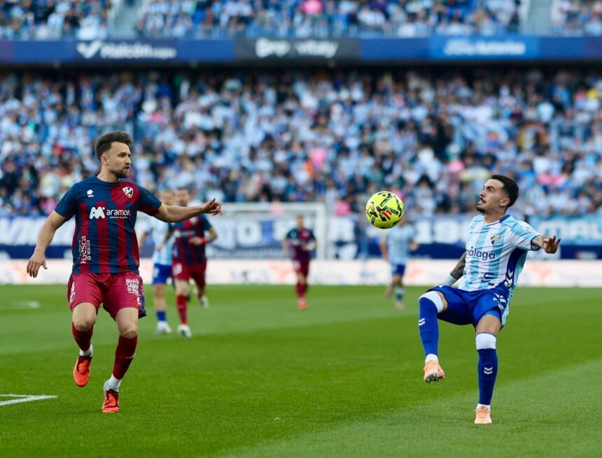 En directo, Málaga CF-SD Huesca: ¡Chupete sentencia el partido! (4-3) En directo, Málaga CF-SD Huesca: ¡Chupete sentencia el partido! (4-3)